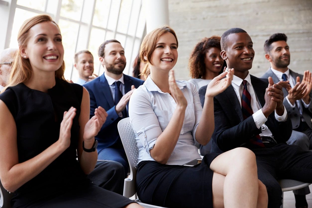 A group of professionals collaborating in a modern office space.